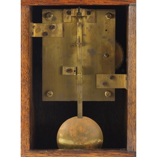 87 - British military World War II RAF Officer's mess clock housed in an oak case, the movement stamped S... 