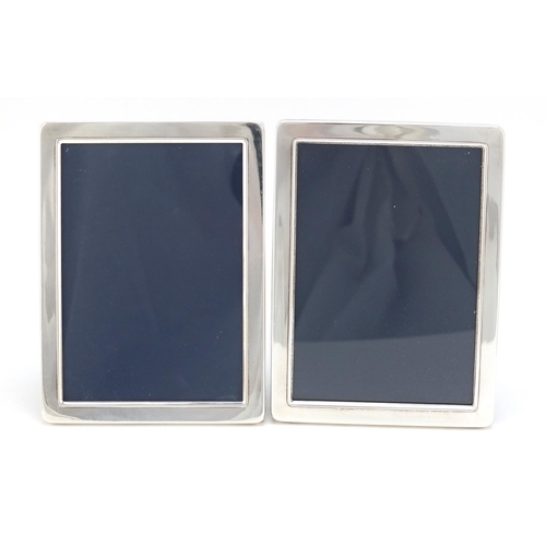 2456 - Two rectangular silver easel photo frames by Mappin & Webb and Carrs, each 15cm x 11cm