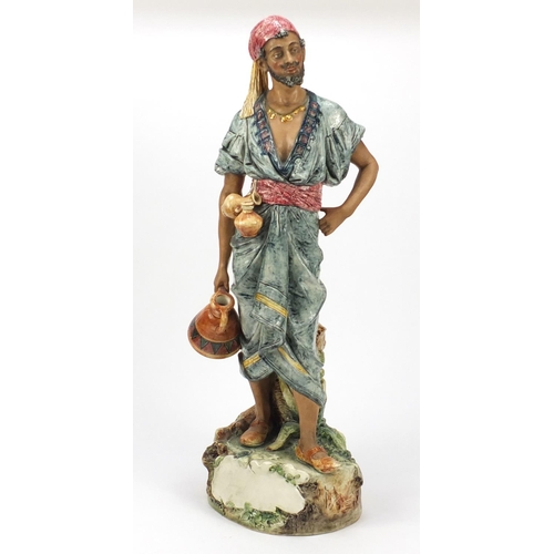 604 - 19th century continental hand painted umbrella stand of an Arab, 56.5cm high