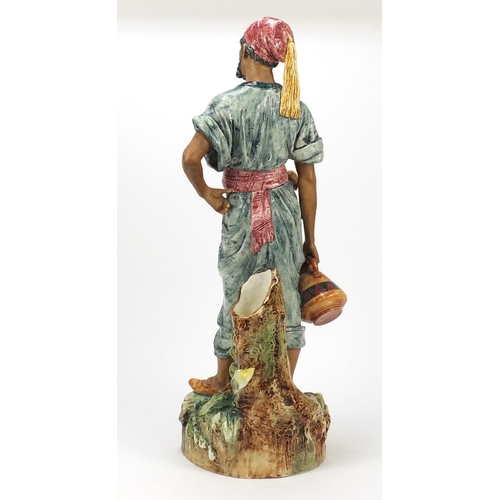 604 - 19th century continental hand painted umbrella stand of an Arab, 56.5cm high