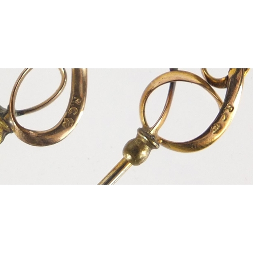 18 - Five Art Nouveau 9ct gold hat pins, the largest 20cm in length