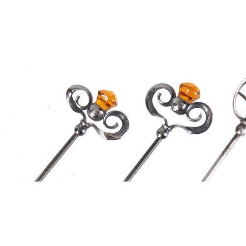 8 - Two pairs of Art Nouveau silver hat pins by Charles Horner, comprising two set with citrine and two ... 