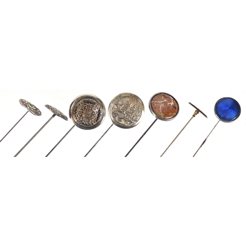16 - Seven vintage hat pins including two Art Nouveau silver examples and two enamelled, the largest 26.7... 