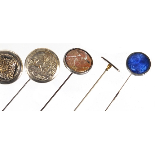 16 - Seven vintage hat pins including two Art Nouveau silver examples and two enamelled, the largest 26.7... 