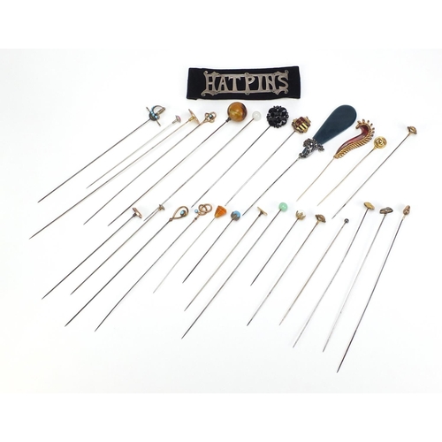 21 - Collection of vintage hat pins including one unmarked gold, some enamelled, cameo and turquoise, the... 
