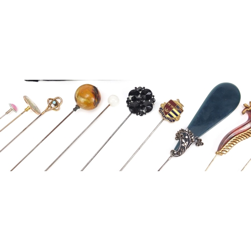 21 - Collection of vintage hat pins including one unmarked gold, some enamelled, cameo and turquoise, the... 