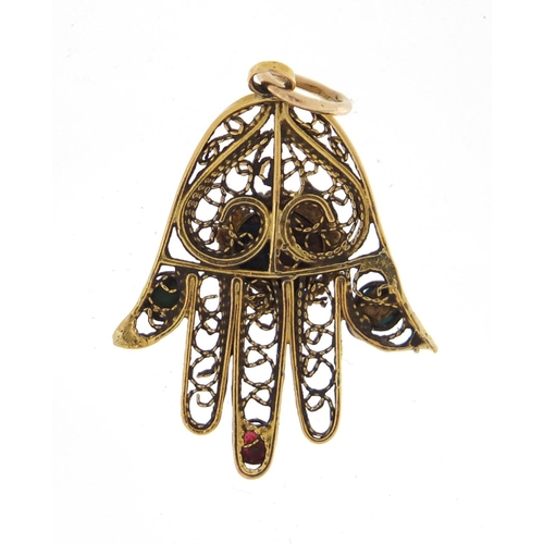 765 - Unmarked gold Hand of Fatima pendant set with semi precious stones including turquoise and garnet, 3... 