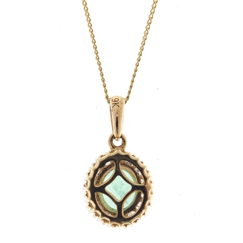 760 - 9ct gold emerald and diamond pendant on a 9ct gold necklace, the pendant 1.5cm in length, 1.0g