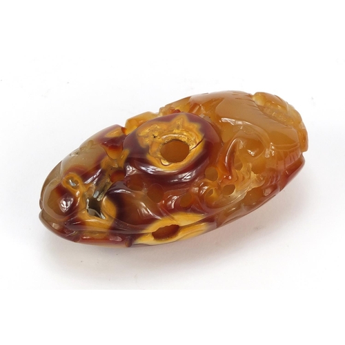 2463 - Large Chinese agate pendant carved with a dragon, 10cm in length