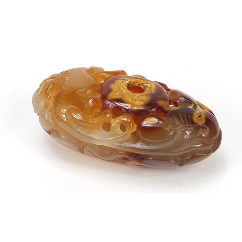 2463 - Large Chinese agate pendant carved with a dragon, 10cm in length