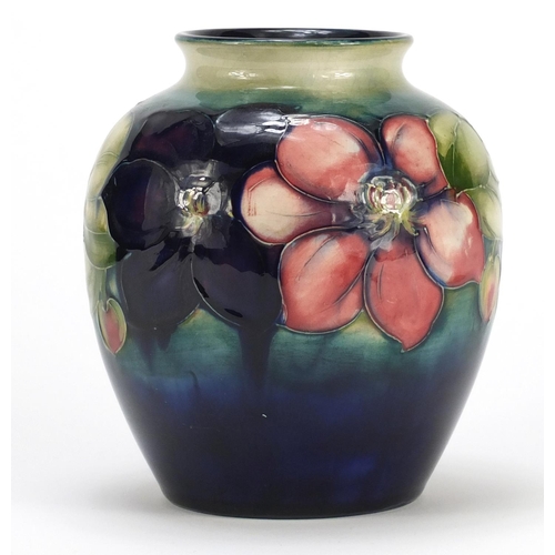 607 - Moorcroft pottery vase hand painted with flowers, part label, painted and impressed marks to the bas... 