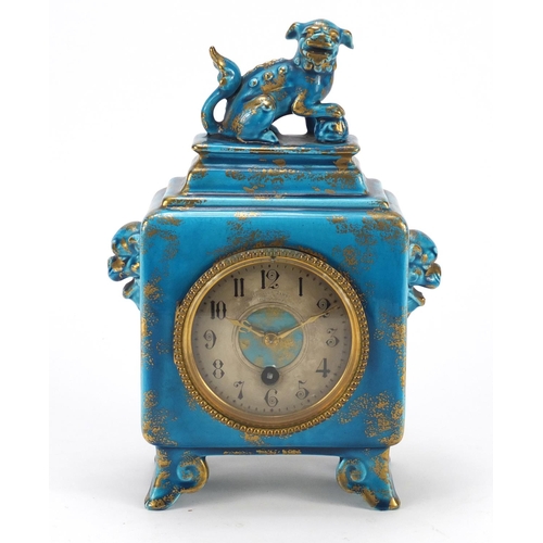 599 - Aesthetic pottery mantle clock mounted with a with Foo dog by Jules Vieillard, the circular dial wit... 