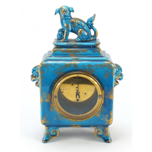 599 - Aesthetic pottery mantle clock mounted with a with Foo dog by Jules Vieillard, the circular dial wit... 