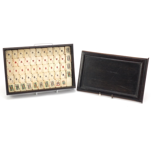 149 - Mahjong type deck of cards housed in a hardwood case, case 25.5cm wide