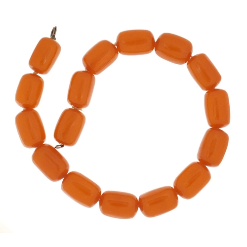 782 - Amber coloured bead necklace, each bead 2.5cm in length, overall 40cm in length, 74.0g