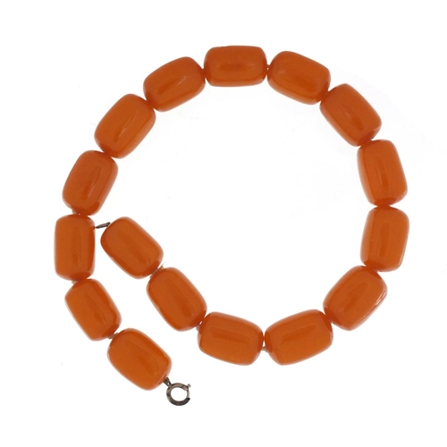 782 - Amber coloured bead necklace, each bead 2.5cm in length, overall 40cm in length, 74.0g