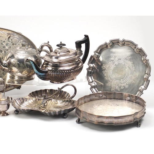 2077 - Silver plate including a three branch candelabra, tea pot, trays and a salver, the largest 29cm high