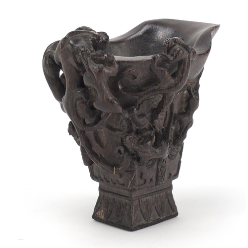 2491 - Chinese carved horn libation cup, character marks to the base, 10cm high