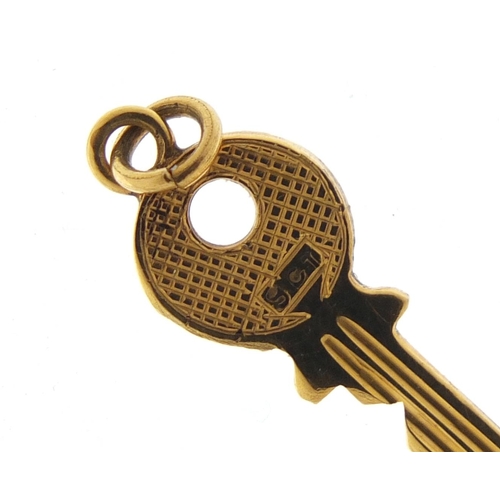 2584 - 9ct gold key charm, 2cm in length, 0.7g