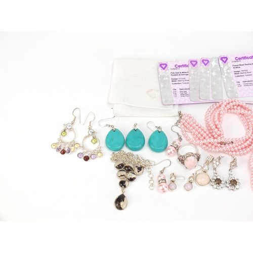 2585 - Silver semi precious stone jewellery with certificates including pink opal, turquoise and smokey qua... 