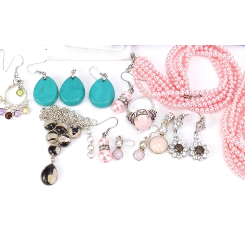 2585 - Silver semi precious stone jewellery with certificates including pink opal, turquoise and smokey qua... 