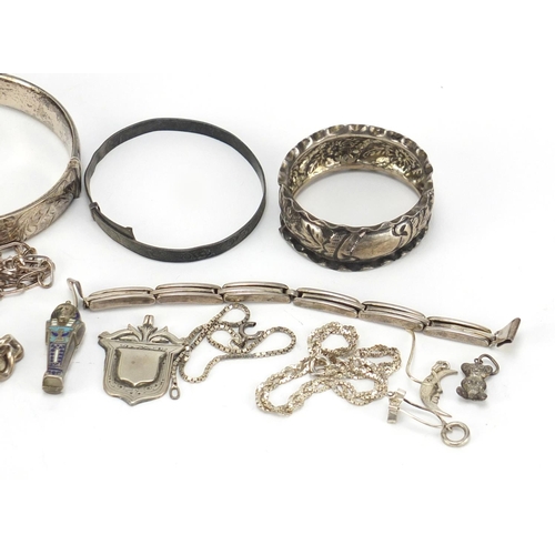 2593 - Mostly silver jewellery including enamelled Tutankhamun coffin, identity bracelet, necklaces and a n... 