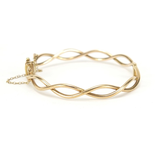 2538 - 9ct gold bracelet, 6.5cm in diameter, 8.4g