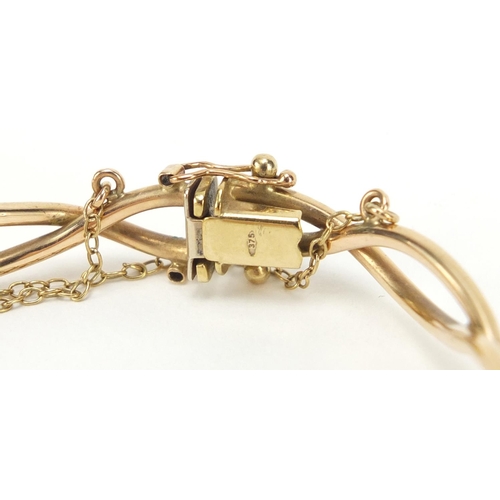 2538 - 9ct gold bracelet, 6.5cm in diameter, 8.4g