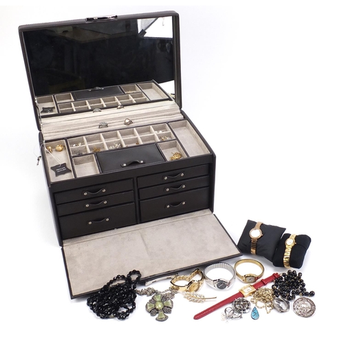 2628 - Costume jewellery including pairs of 9ct gold earrings, wristwatches and silver rings, housed in a b... 