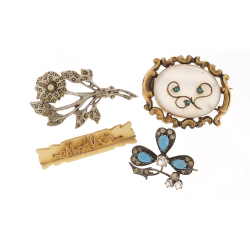 2586 - Four Victorian and later brooches, some set with turquoise and clear stones, the largest 4.5cm in le... 