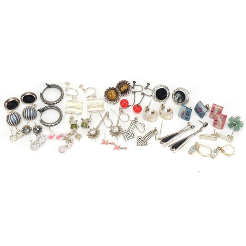 2590 - Large selection of mostly silver earrings, some set with semi precious stones and some enamelled, 62... 