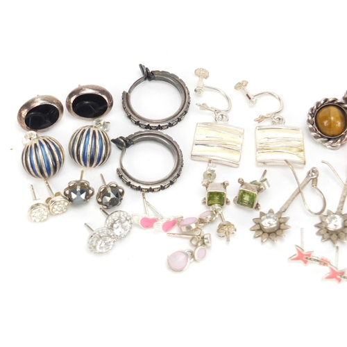 2590 - Large selection of mostly silver earrings, some set with semi precious stones and some enamelled, 62... 