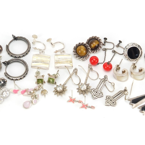 2590 - Large selection of mostly silver earrings, some set with semi precious stones and some enamelled, 62... 