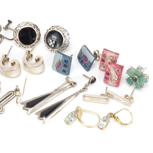 2590 - Large selection of mostly silver earrings, some set with semi precious stones and some enamelled, 62... 