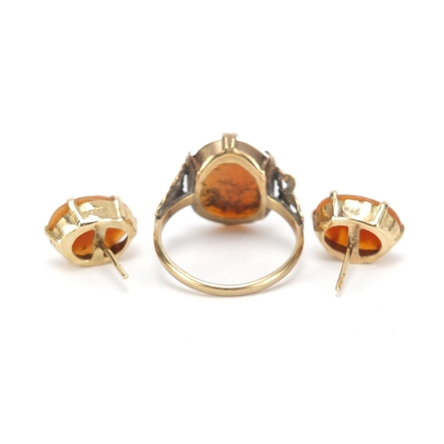 2594 - 9ct gold cameo ring, size N and a pair of matching earrings, 4.6g