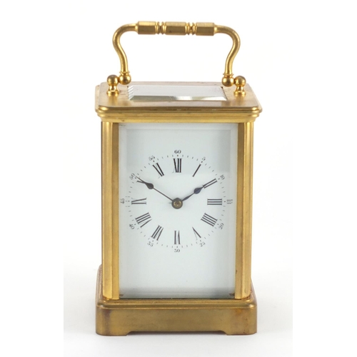 82A - Gilt brass carriage clock with enamelled dial, Roman numerals and velvet lined case, the back plate ... 