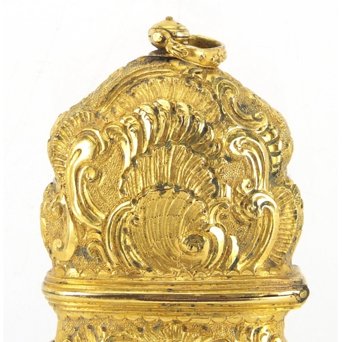 25 - 18th century Rococo gilt metal repoussé etui decorated with nude maidens within C scrolls, the fitte... 