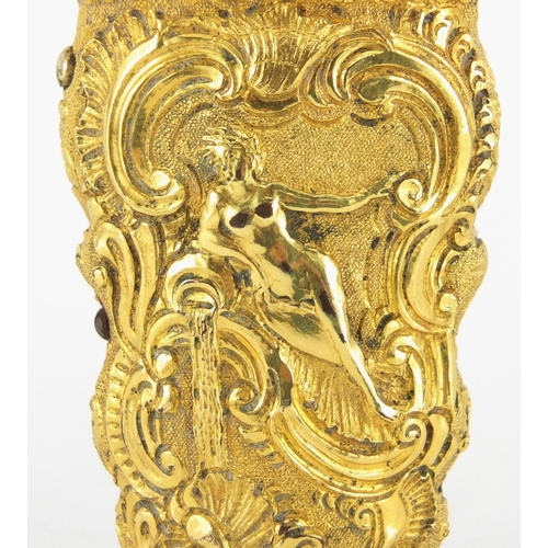 25 - 18th century Rococo gilt metal repoussé etui decorated with nude maidens within C scrolls, the fitte... 