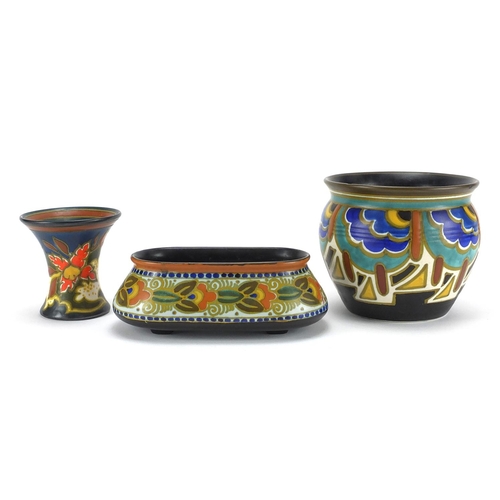 602 - Dutch Art art pottery by Gouda comprising miniature jardinière, vase and four footed planter, each h... 