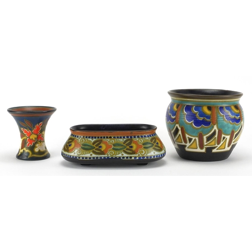 602 - Dutch Art art pottery by Gouda comprising miniature jardinière, vase and four footed planter, each h... 