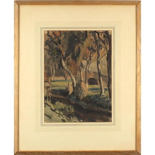 940 - Ernest Sallis Benney - Stream through woodland with a bridge, watercolour, mounted and framed, 38cm ... 