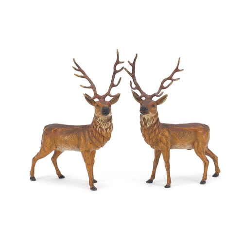 120 - Pair of cold painted spelter stags, each 20cm high