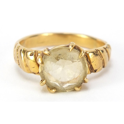 768 - Unmarked gold citrine solitaire ring with rope twist shoulders, size N, 5.2g