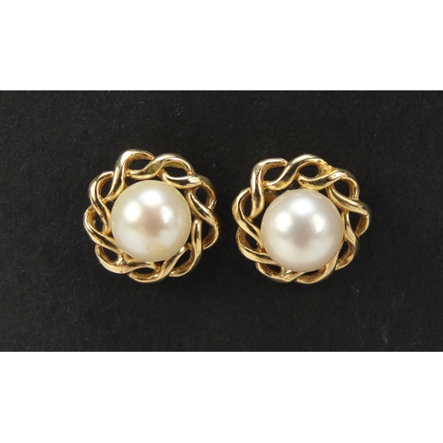 773 - Pair of 9ct gold pearl earrings, 1cm in diameter, 2.2g