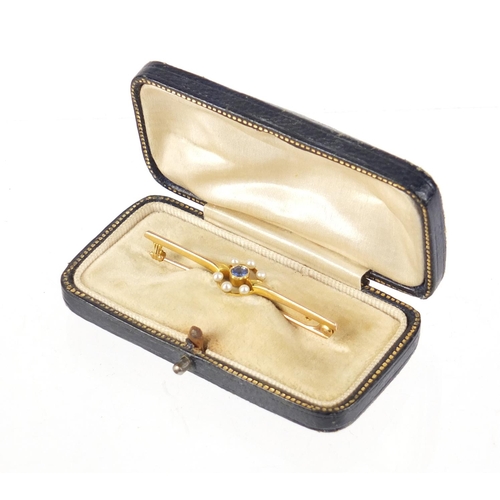 769 - Art Deco 15ct gold sapphire and seed pearl bar brooch, housed in a fitted tooled leather box, 5.2cm ... 