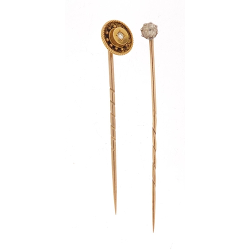 771 - Two Victorian unmarked gold diamond solitaire tie pins, 3.3g