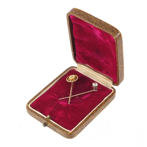 771 - Two Victorian unmarked gold diamond solitaire tie pins, 3.3g