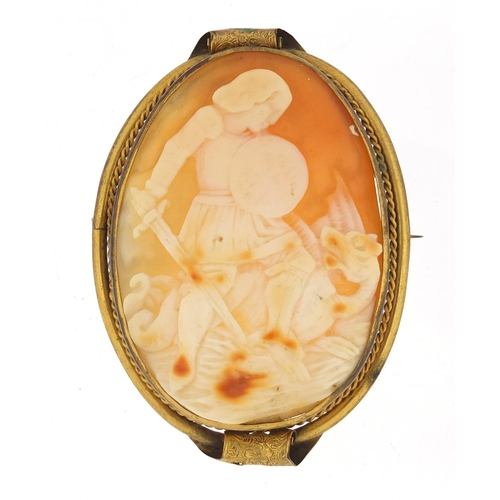 774 - Large Victorian cameo brooch carved with St George and the dragon, set in a gilt metal mount, 7cm hi... 