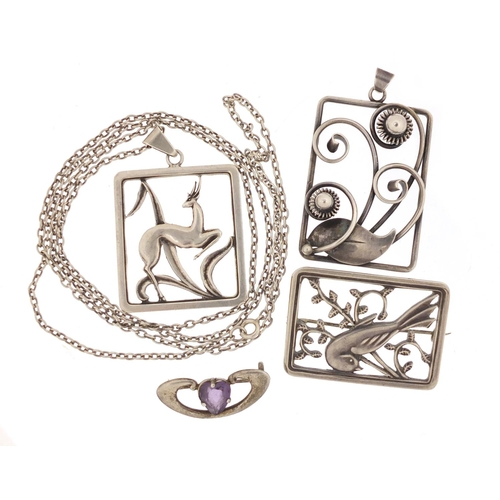 757 - Three Danish silver pendants and brooches and an Art Nouveau amethyst brooch by Charles Horner, the ... 