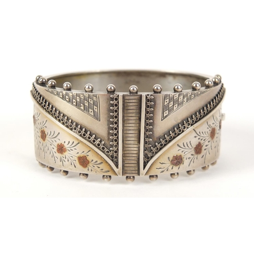 770 - Victorian Aesthetic silver bangle, stamped sterling to the clasp, 37.4g